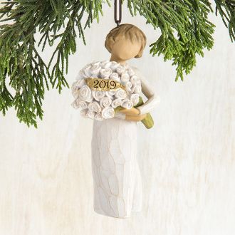 A serene Willow Tree figurine ornament