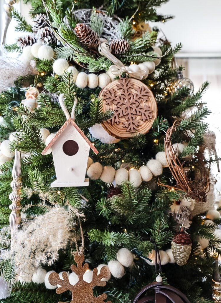 Woodland Christmas tree base with pinecones and twigs